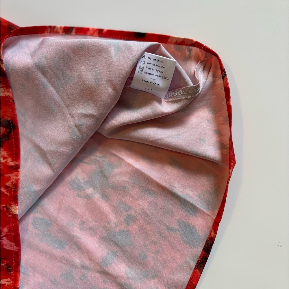 Vibrant Red, Brown, & White Asymmetrical Blouse, Ties into a Bow at one Shoulder - Picture 6 of 6